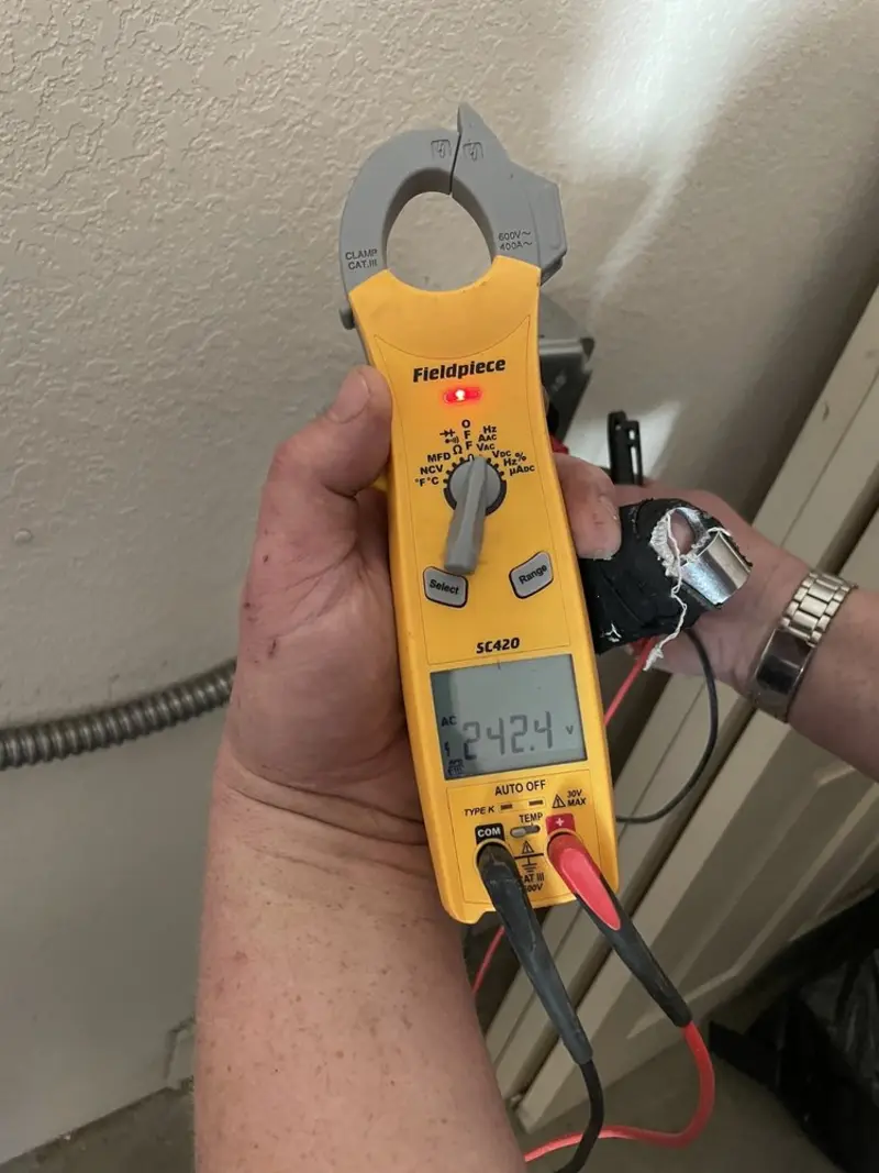 Voltage testing with clamp meter during Generator Installation in North Chicago